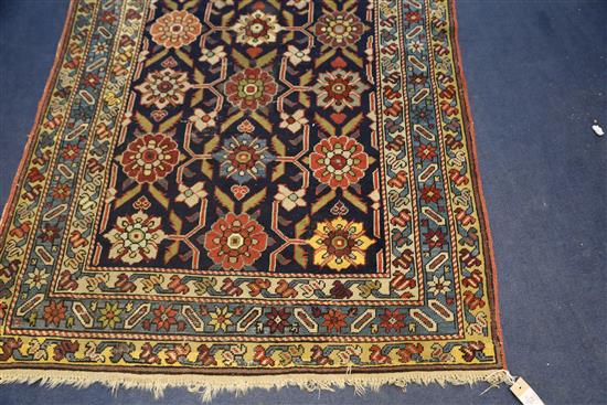 A Caucasian blue ground runner, 13ft 2in by 3ft 8in.